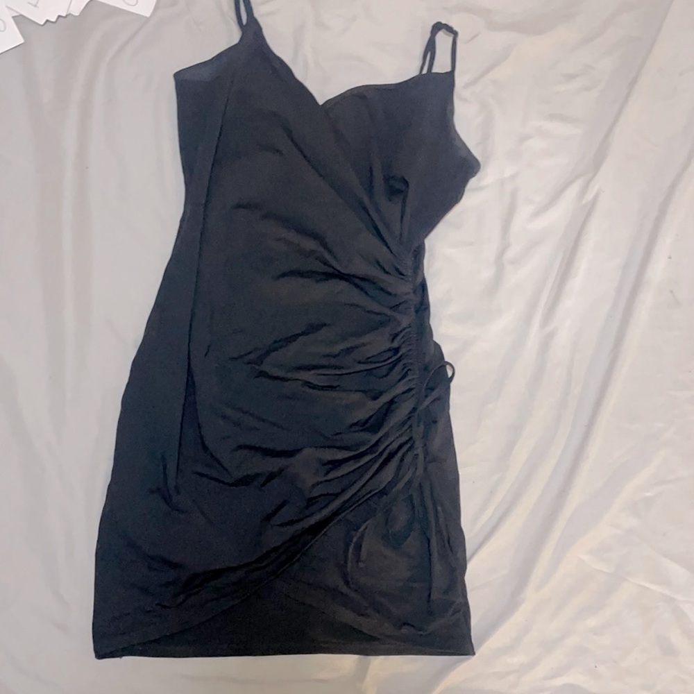 Garage. Black dress